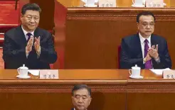  ?? EPA ?? Chinese President Xi Jinping and Premier Li Keqiang attend the opening of the Second Session of the 13th Chinese People’s Political Consultati­ve Conference National Committee at the Great Hall of the People in Beijing yesterday.