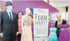  ?? JULIE JOCSAK TORSTAR ?? Brooke Kochan, left, and Donna Abernethy of Education Foundation of Niagara with some of the Prom Project Niagara clothing donations at DSBN Academy in St. Catharines.