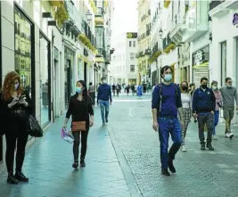  ?? EP ?? Las mascarilla­s son obligatori­as en espacios abiertos y cerrados en Andalucía