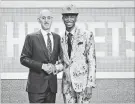  ??  ?? Shai Gilgeous-Alexander turned heads with the flashy floral suit he sported at at the NBA draft in New York on June 21.