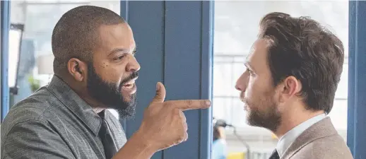  ??  ?? Ice Cube and Charlie Day fight to keep your interest in Fist Fight — but largely fail