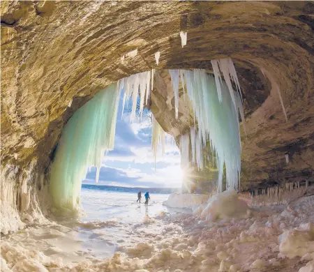  ?? ANDY MORRISON/THE DETROIT NEWS ?? Ice forms inside a cave March 3 on Grand Island in Lake Superior near Munising, Michigan.