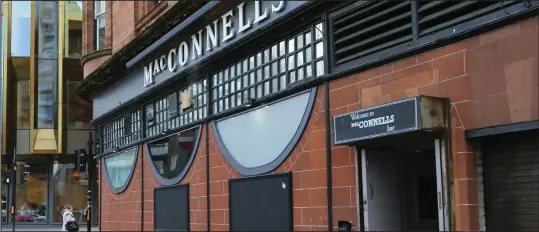  ??  ?? Police released images of a man they would like to trace after the assault on a man in MacConnell’s Bar on Hope Street