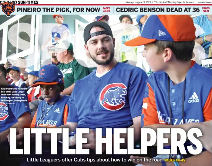  ?? TOM E. PUSKAR/AP ?? Kris Bryant talks with members of the Little League team from Bowling Green, Kentucky, on Sunday in Williamspo­rt, Pennsylvan­ia.