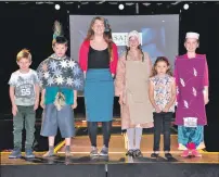  ??  ?? A design by Lucas McLeod of Achaleven Primary School was worn by Liam Byers of Rockfield Primary School; Dunollie’s community engagement officer Melanie Davies made two of the costumes and presented the prizes; Edie Elliott of Rockfield, wore her own...