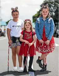  ?? ?? Cara Edwards, 9, Meila Fabish, 5, and Alyssa Fabish, 9, were dressed up for the parade.