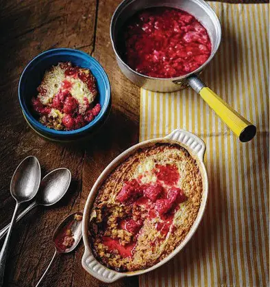  ?? Craig Robertson via Washington Post ?? Baked vanilla oats with cardamom, raspberry and rose syrup is one of several desserts featured in “Taste & Flavour.”