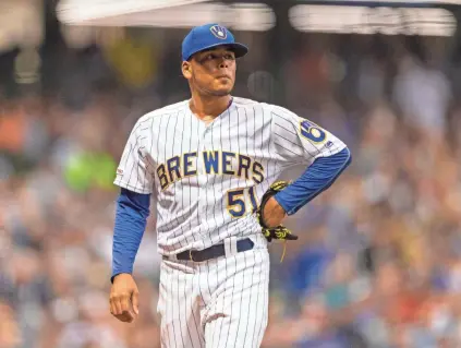  ?? JEFF HANISCH, JEFF HANISCH-USA TODAY SPORTS ?? Brewers pitcher Freddy Peralta wears a disappoint­ed look as he walks off the field after allowing the Phillies to take the lead in the sixth inning Friday.