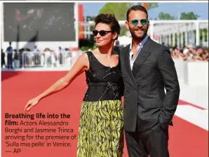  ?? — AP ?? Breathing life into the film: Actors Alessandro Borghi and Jasmine Trinca arriving for the premiere of ‘ Sulla mia pelle’ in Venice.