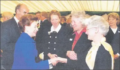  ??  ?? 1996 - Princess Margaret opened the Coventry Service Centre – speaking to members of the Market Bosworth group. From left to right is: Princess Margaret, Sue Nedjati, Ella Jepson (now sadly deceased) and Fiona Frisby