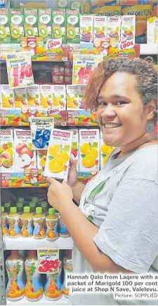  ?? Picture: SUPPLIED ?? Hannah Qalo from Laqere with a packet of Marigold 100 per cent juice at Shop N Save, Valelevu.
