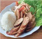  ?? COURTESY OF MEKONG CAFE ?? Mekong Cafe’s Chanta’s sausage with papaya salad is a recipe handed down through generation­s in the family. It’s also a favorite at the cafe.