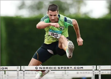  ??  ?? Ger Cremin of An Riocht AC, on his way to winning the 35+ Mens 110m Hurdles event during the GloHealth National Master Track & Field Championsh­ip 2016 at Tullamore Harriers Stadium in Tullamore, Co Offaly. Photo by Sportsfile