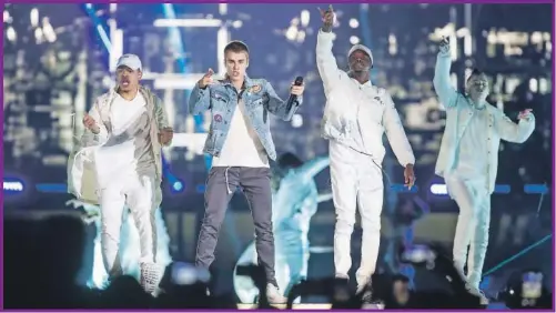  ??  ?? Justin Bieber, amigo de los integrante­s de One Direction, asegura que es un hecho que la boyband regrese al mercado