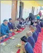  ?? HT PHOTO ?? Students had midday meal together with education officials in GIC Sukhidhang,Champawat district on Monday.