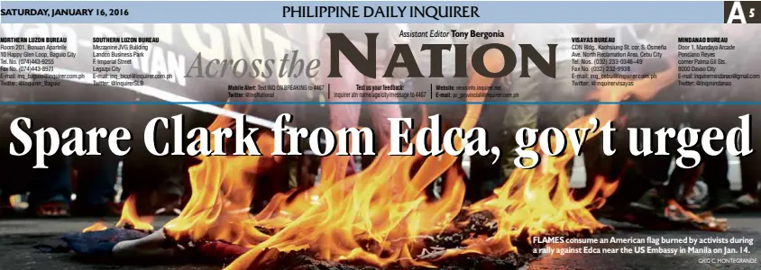  ?? GRIG C. MONTEGRAND­E ?? FLAMES consume an American flag burned by activists during a rally against Edca near the US Embassy in Manila on Jan. 14.