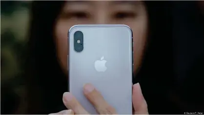  ??  ?? Presentaci­ón de un nuevo modelo de iPhone en Pekín en 2017.
