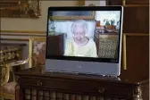  ?? VICTORIA JONES — POOL ?? Queen Elizabeth II appears on a screen via videolink from Windsor Castle during a virtual audience at Buckingham Palace, London, on Tuesday.