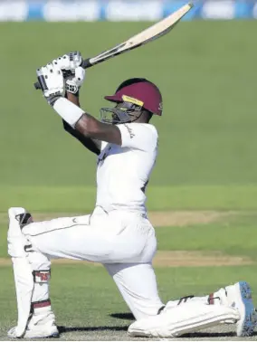  ?? (Photos: AFP) ?? West Indies batsman Jermaine Blackwood plays a shot on the second day of the second Test match against New Zealand at Basin Reserve in Wellington, yesterday.