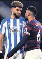  ??  ?? Philip Billing squares up to Newcastle’s Jamaal Lascelles