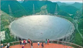 ?? WU DONGJUN / FOR CHINA DAILY ?? The Five-hundred-meter Aperture Spherical Telescope has become a popular tourist attraction in Guizhou province’s Pingtang county.