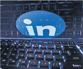  ?? Picture: REUTERS ?? A keyboard is placed in front of a displayed LinkedIn logo in this illustrati­on taken February 21, 2023.