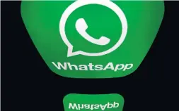  ?? LIONEL BONAVENTUR­E AFP VIA GETTY IMAGES FILE PHOTO ?? In January, WhatsApp delayed a data-sharing change as users worried about privacy fled the Facebook-owned service and flocked to rivals like Telegram.