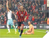  ??  ?? ■ Bournemout­h’s Joshua King celebrates.