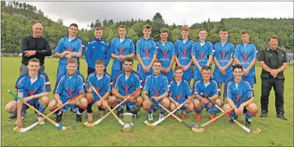  ?? Photo: Stephen Lawson ?? The winning North squad pictued with the Caol Cup along with coaches Stevie Borthwick and Norman MacArthur.