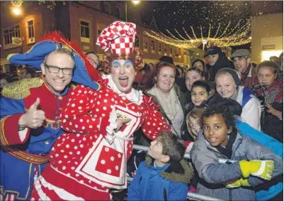  ??  ?? Panto stars Lloyd Hollett and Ben Roddy with spectators at the switch-on the Canterbury Christmas