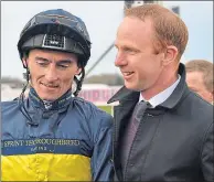  ??  ?? Trainer David O’Meara celebrates Lincoln success with jockey Danny Tudhope two years ago