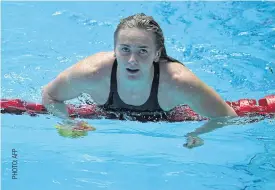  ??  ?? Australia’s Ariarne Titmus celebrates her win in the 400m freestyle.