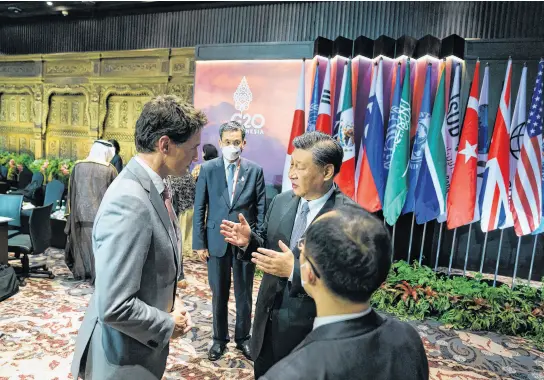  ?? REUTERS ?? Prime Minister Justin Trudeau speaks with China’s President Xi Jinping at the G20 Leaders’ Summit in Bali, Indonesia, Nov. 16.