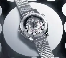  ?? ?? RIGHT Caseback replicates the 007 opening sequence.