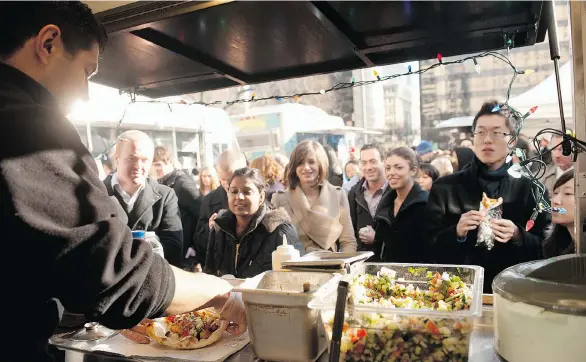  ?? PHOTOS: ROB GILBERT/TOURISM VANCOUVER ?? Hungry crowds line up at Street Food City, one of the most popular events during Dine Out Vancouver which has grown to attract more than 100,000 attendees each year.