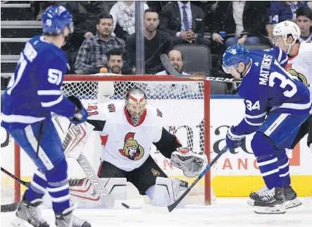  ?? FRANK GUNN/THE CANADIAN PRESS ?? Ottawa goaltender Craig Anderson makes a save from in close on Maple Leafs centre Auston Matthews during a 4-3 Senators victory on Wednesday night at the Air Canada Centre in Toronto. Anderson stopped 45 of 48 shots in the win.