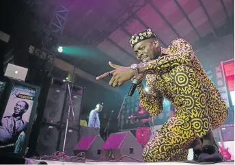  ?? / EMMANUEL AREWA / AFP ?? Adekunle Gold and his 79th Element Band perform at the festival dedicated to the pioneer of Afrobeat, Fela Anikulapo Kuti, during the annual Felabratio­n Musical Concert in Lagos last Thursday.