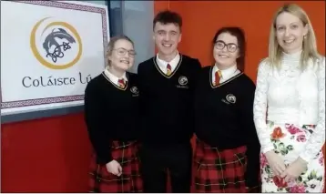  ??  ?? Colaiste Lu debaters Ellen, Lauryn and Rónán with Neasa Ní Chonluain.