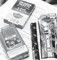  ?? BALTIMORE SUN ?? Tobacco companies are increasing­ly marketing products other than cigarettes, including e-cigarettes and flavored cigars that are popular among minors. In Maryland, it’s legally questionab­le whether local government­s can regulate the sale of such products. A bill pending in Annapolis seeks to clarify that counties and municipali­ties have that authority.