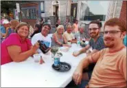  ??  ?? David Esser, Kempton, 2nd from left, with friends at KCP’s 2017 Dinner on Main. The community is invited to come out to eat dinner on West Main Street where tables will be set up.