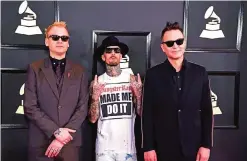  ??  ?? This file photo shows Blink 182 arriving for the 59th Grammy Awards pre-telecast in Los Angeles, California. — AFP