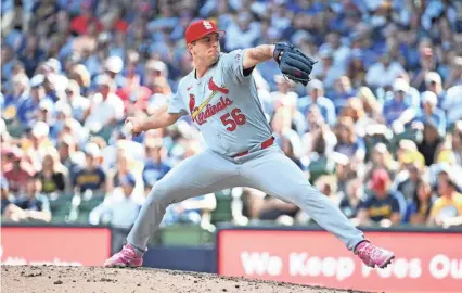 ?? MICHAEL MCLOONE/USA TODAY SPORTS ?? Cardinals pitcher Ryan Helsley throws against the Milwaukee Brewers on Sunday in Milwaukee. The Cardinals won 4-3 to end a seven-game losing streak.