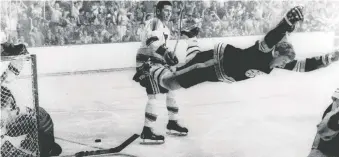  ?? RAY LUSSIER/THE ASSOCIATED PRESS ?? Bobby Orr scoring the Stanley Cup-clinching goal for the Boston Bruins against the St. Louis Blues on May 10, 1970 is a Mount Rushmore all-time sports moment for Don Brennan.