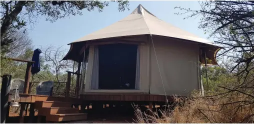  ??  ?? OUR tented camps boasted a private viewing deck, a king size bed, an indoor bathroom, an outdoor shower, a ceiling fan, a bar fridge fully stocked with refreshmen­ts and other amenities one would expect in a hotel room.