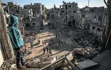  ?? Picture: Fatima Shbair/Getty Images ?? Palestinia­ns return to the rubble of their homes in Beit Hanoun, Gaza, after a ceasefire between Israeli forces and Hamas. Israel pounded the territory for 11 days in retaliatio­n for rocket attacks, but the author argues that the Israeli response was out of all proportion.