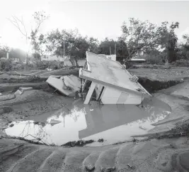  ?? ALEJANDRO GRANADILLO AP ?? Hurricane Fiona left many destroyed homes in Villa Esperanza, in Salinas, Puerto Rico, last week.