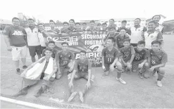  ??  ?? Sacred Heart School-Ateneo de Cebu booters celebrate after claiming the secondary division title of the 2018 Cebu Schools Athletic Foundation Inc. (CESAFI) football tournament yesterday at the Cebu City Sports Center. PAUL JUN E. ROSAROSO