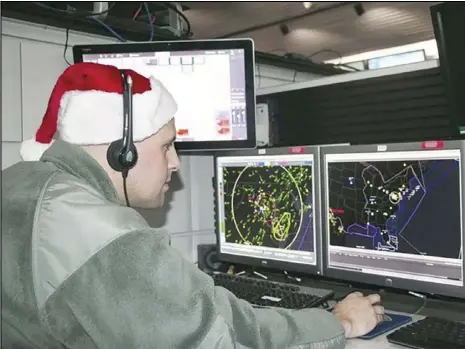  ?? Photo courtesy of NORAD Tracks Santa ?? On Christmas Eve, the high-tech sensors of the North American Aerospace Defense Command are put to a more festive use to track Santa’s annual journey around the world. Those anticipati­ng his arrival can follow his travels online or by calling a volunteer-staffed hotline.