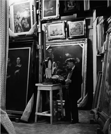  ?? PHOTOGRAPH­S: FRED RAMAGE/ GETTY; THE NATIONAL GALLERY, LONDON ?? A worker in 1942 checking a hydrometer in one of the Manod caverns where the National Gallery hid art treasures including Canaletto’s The Stonemason’s Yard, below, until the end of the war