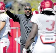  ?? NWA Democrat-Gazette/ANDY SHUPE ?? New Arkansas defensive line coach John Scott said he doesn’t pay much attention to preseason polls. “To me it’s about where you finish,” said Scott, who was on the New York Jets staff last season.